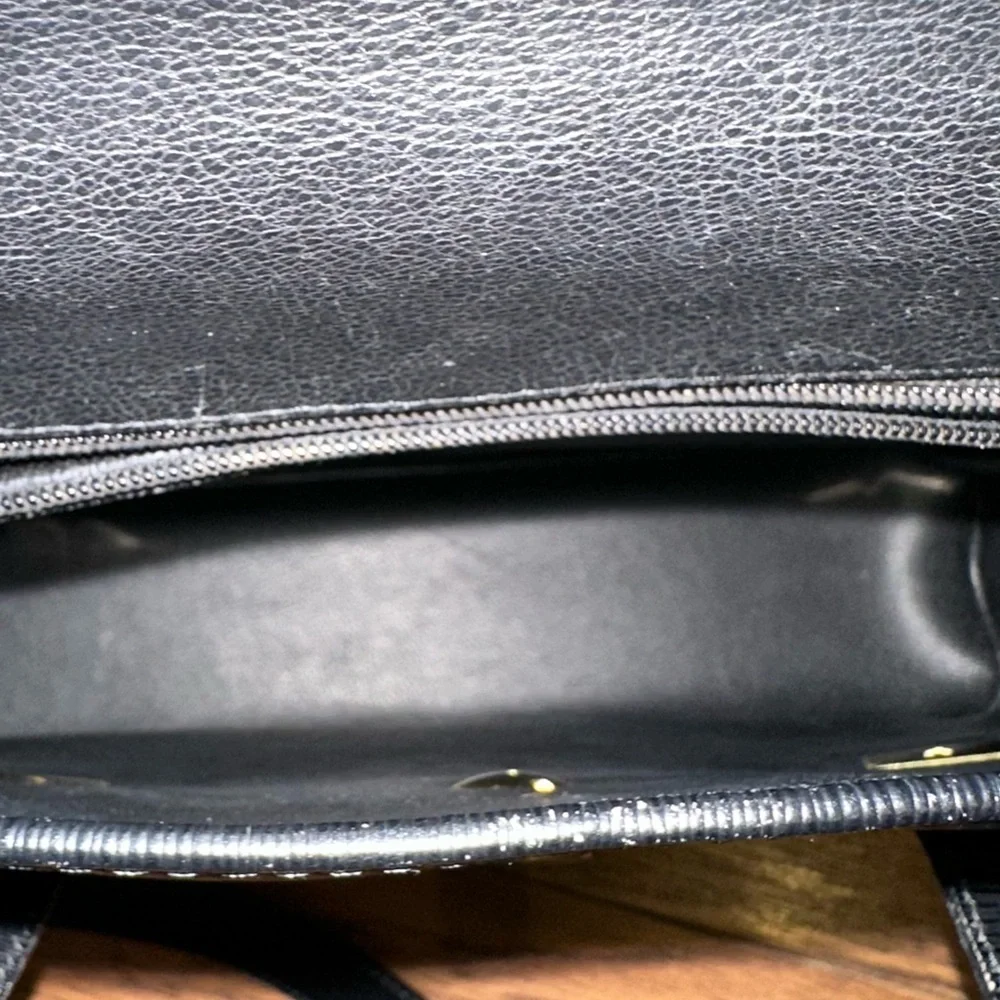 Nina Ricci Black Shoulder Bag with Structured Design and Gold Hardware